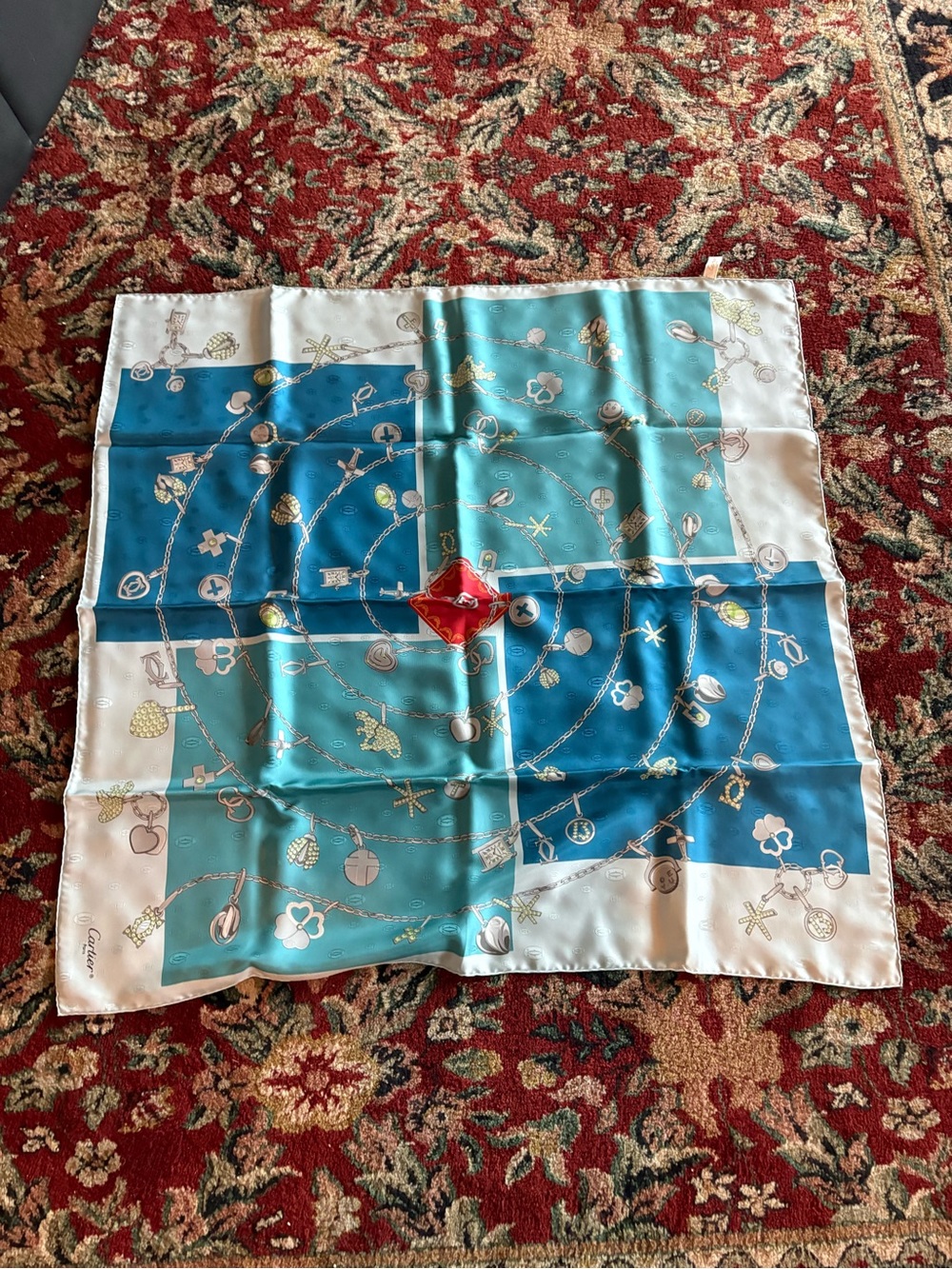vintage Cartier blue silk scarf with a jewelry theme. Brand new